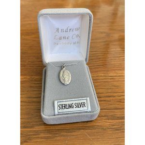 Vintage New Religious pendant on a Sterling Chain